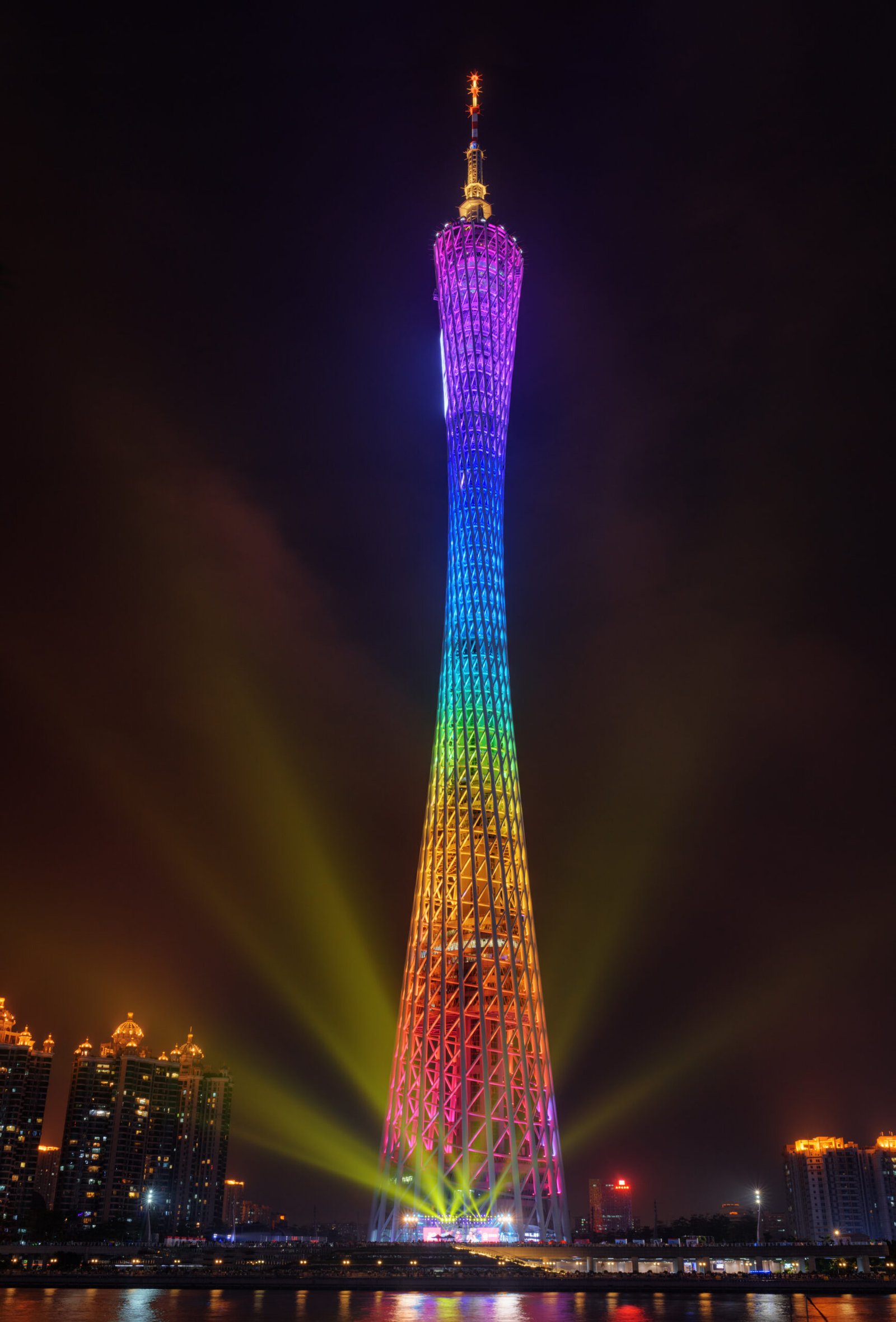 GUANGZHOU, GUANGDONG PROVINCE, CHINA - NOVEMBER 7, 2015: Night view of the Canton Tower (Guangzhou TV Astronomical and Sightseeing Tower). Beautiful colorful tower glows and emits yellow light rays.