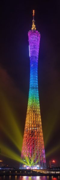 GUANGZHOU, GUANGDONG PROVINCE, CHINA - NOVEMBER 7, 2015: Night view of the Canton Tower (Guangzhou TV Astronomical and Sightseeing Tower). Beautiful colorful tower glows and emits yellow light rays.